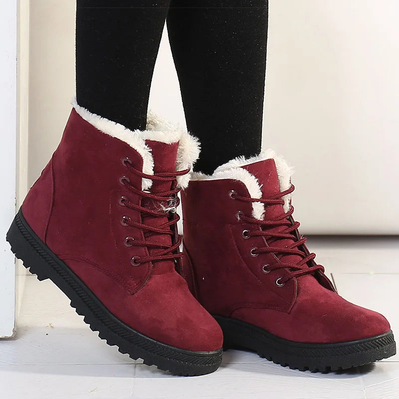 Women's faux-fur-lined lace-up ankle boots with ridged soles